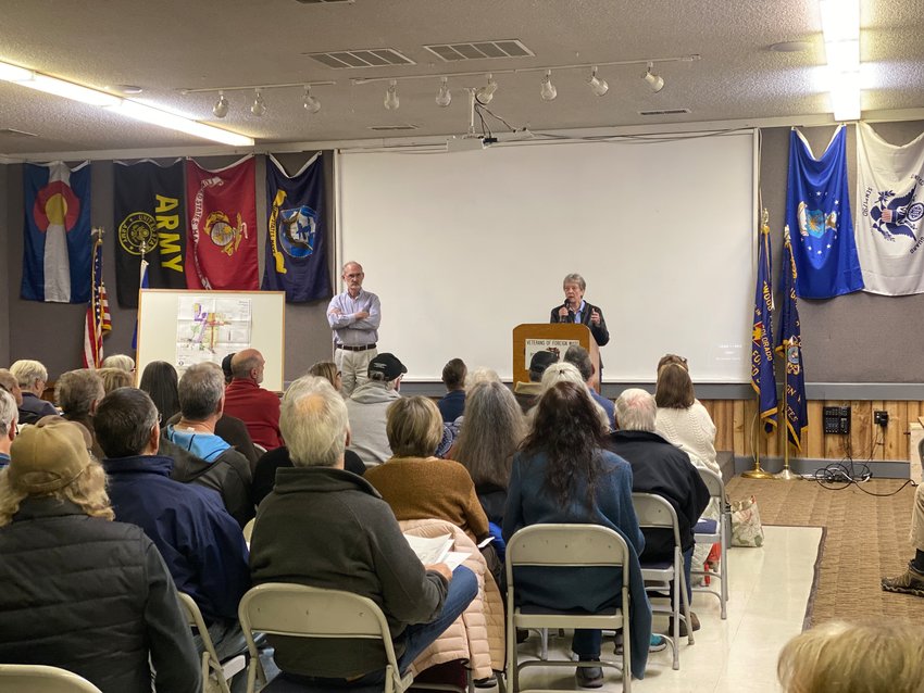 Kurt Suppes, left, stands along with Councilmember Rita Russell at the March 2 town hall at the Veterans of Foreign Wars Post 322 in Englewood.